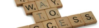 scrabble tiles on a white table - image from Pexels